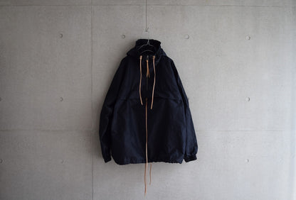 Wright. Oversized pocketable rain parka