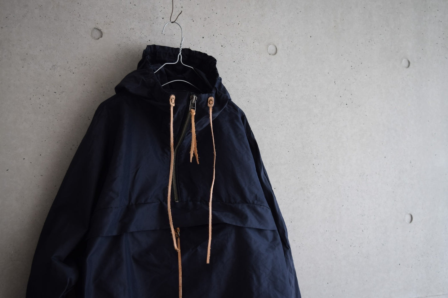 Wright. Oversized pocketable rain parka