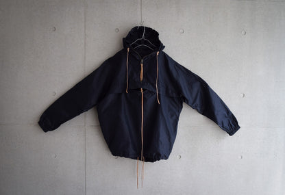 Wright. Oversized pocketable rain parka