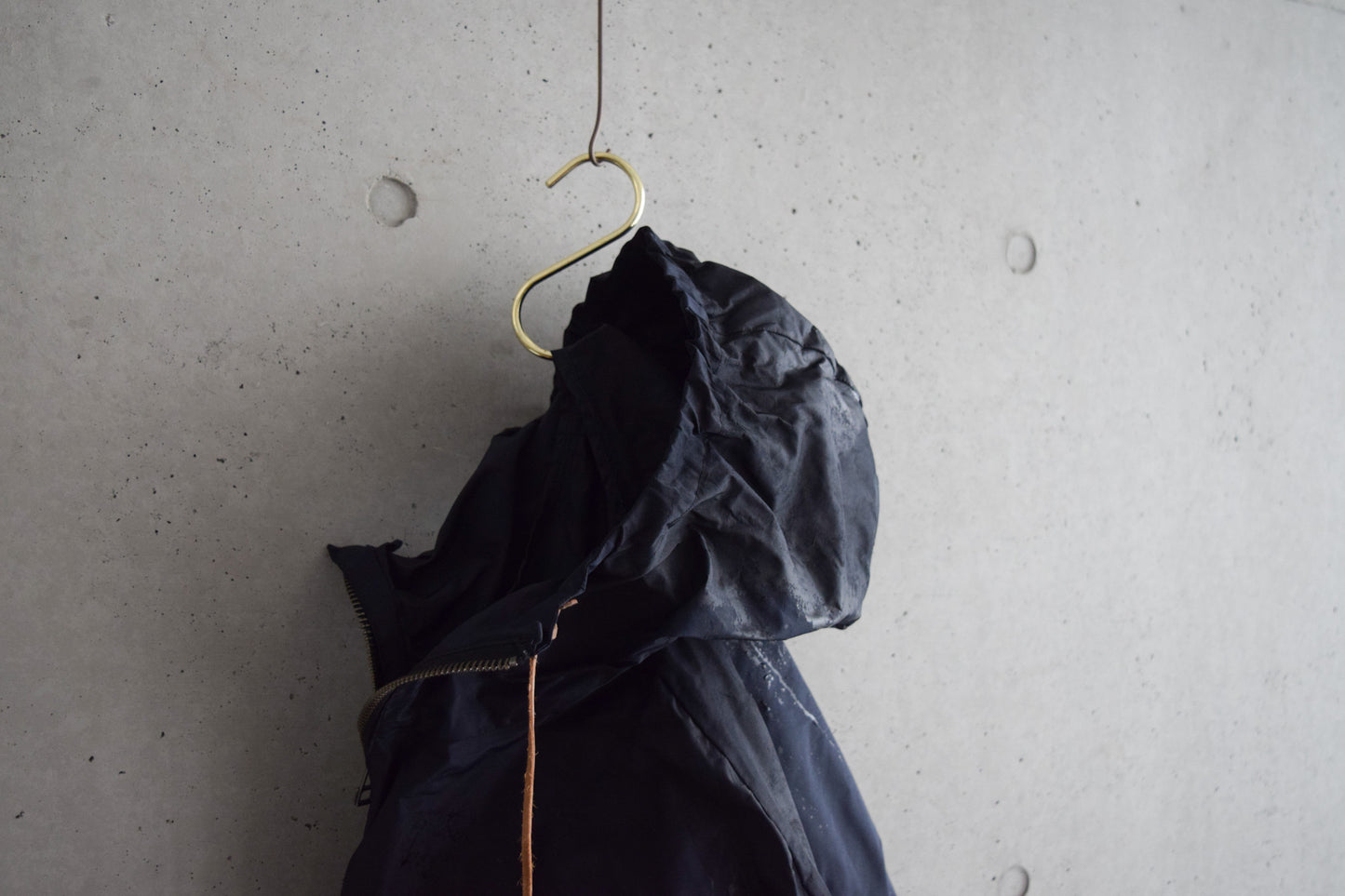 Wright. Oversized pocketable rain parka