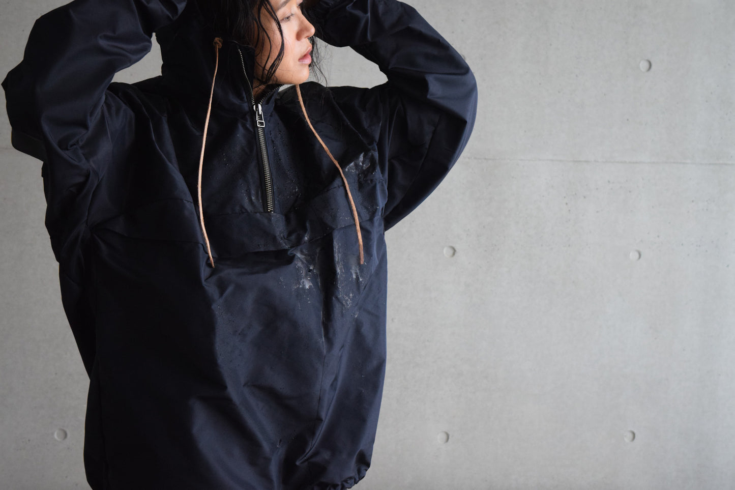 Wright. Oversized pocketable rain parka