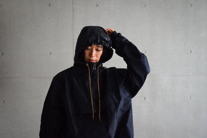 Wright. Oversized pocketable rain parka