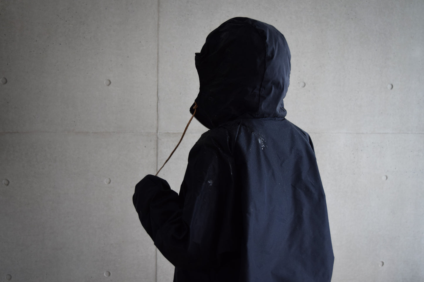 Wright. Oversized pocketable rain parka