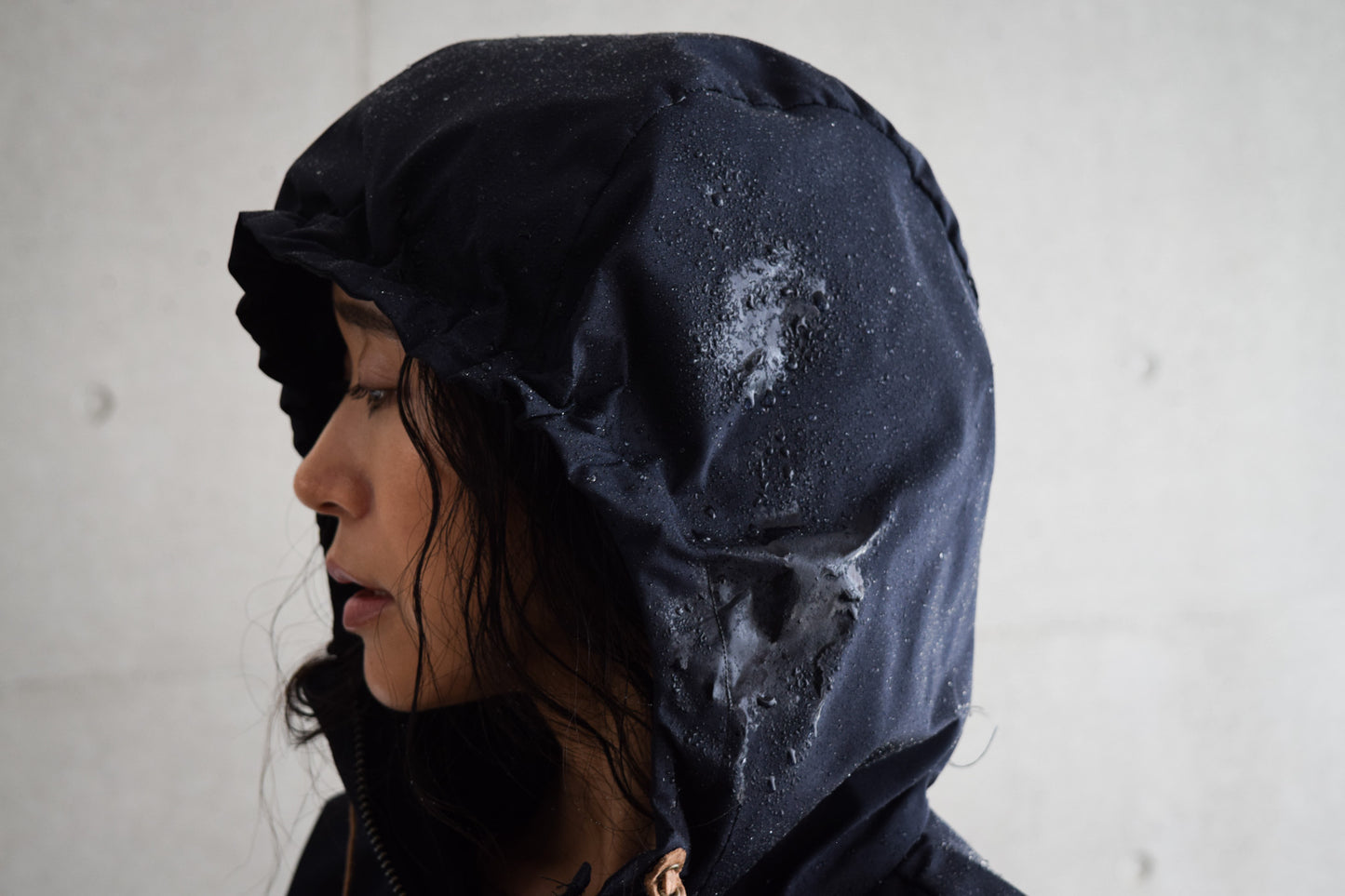 Wright. Oversized pocketable rain parka